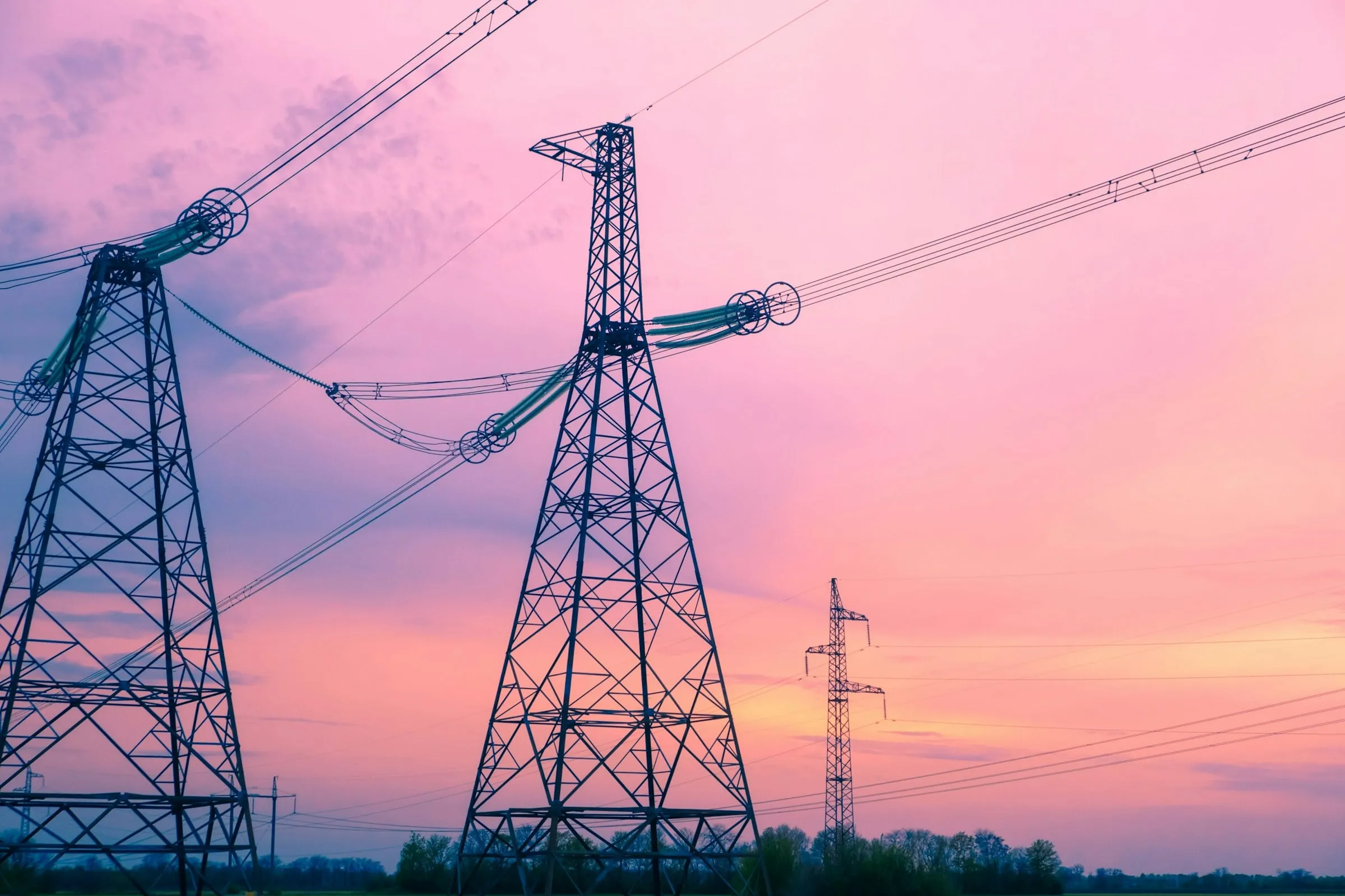 Medium-voltage substation and power distribution equipment at dusk, the grid interconnection point for a battery energy storage system