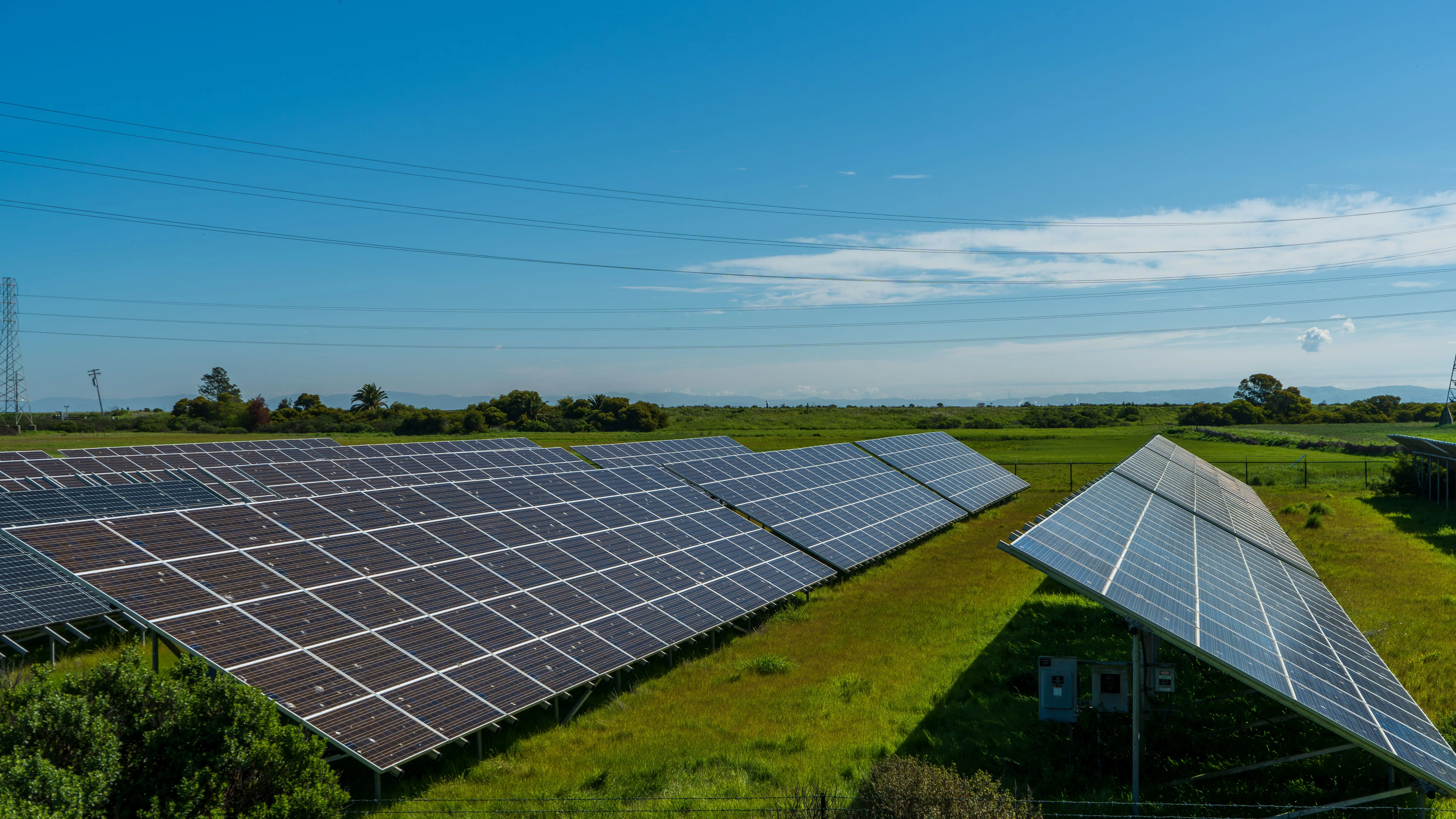 Distribution substation and grid interconnection point for solar and battery energy storage