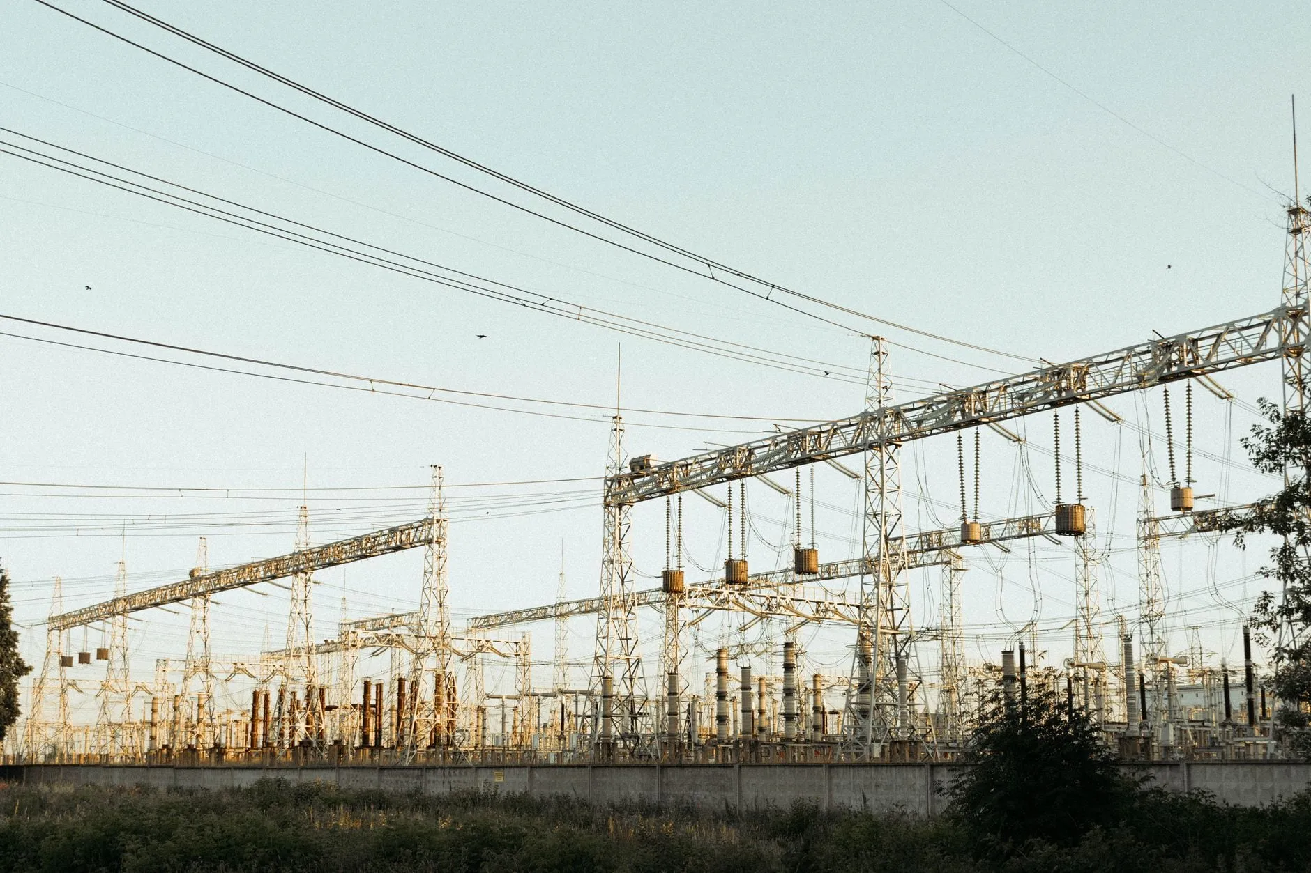 Distribution transformer and secondary conductors feeding low-voltage distribution equipment, governed by NEC 240.21(C) tap rules and CEC Rule 26-256